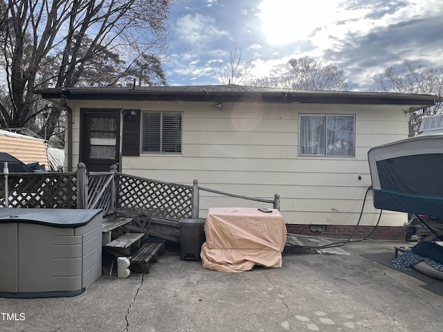 rear view of house with a patio area