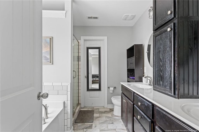 full bathroom with visible vents, a sink, a shower stall, double vanity, and a bath