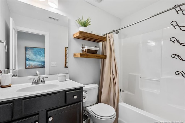 full bath with visible vents, toilet, vanity, and shower / bathtub combination with curtain