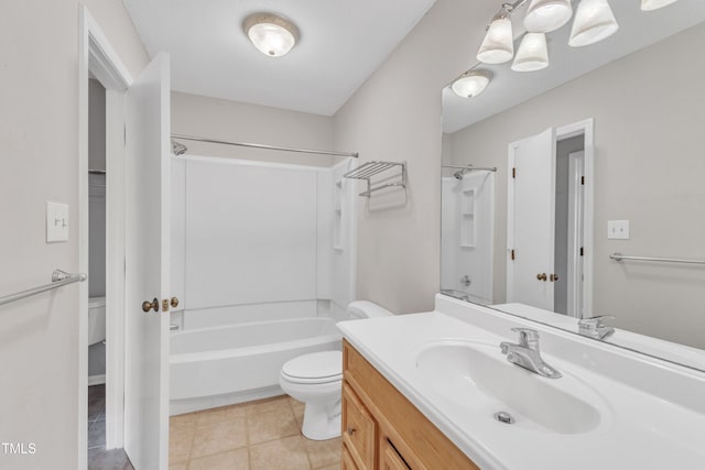 full bathroom with tile patterned flooring, vanity, toilet, and tub / shower combination