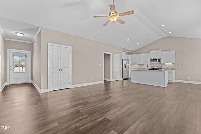 unfurnished living room with dark wood-style floors, baseboards, and a ceiling fan