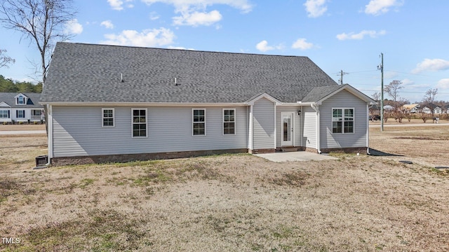 view of front of home featuring a shingled roof