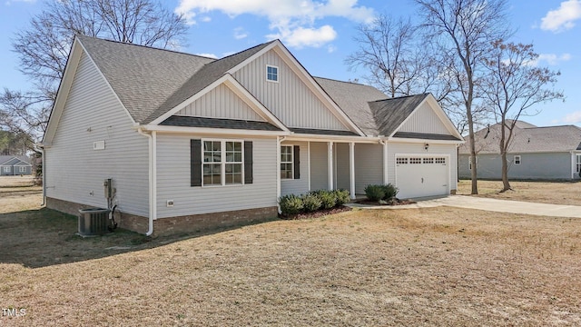 view of front of property featuring concrete driveway, cooling unit, a garage, and roof with shingles