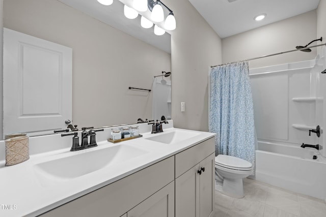 full bath with double vanity, toilet, shower / bath combo with shower curtain, and a sink