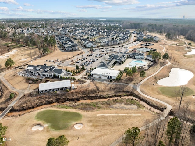 birds eye view of property featuring view of golf course