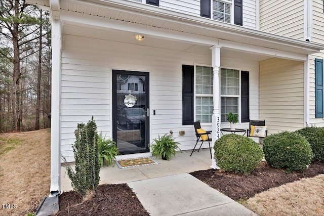 entrance to property with a porch