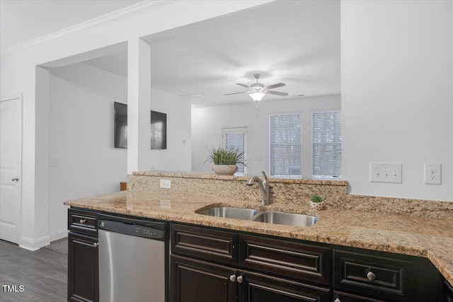 kitchen with a ceiling fan, a sink, light stone counters, dishwasher, and dark wood-style flooring