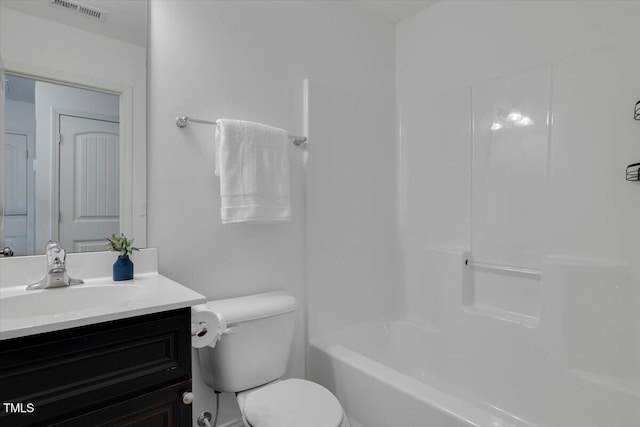 full bathroom featuring visible vents, toilet, and vanity