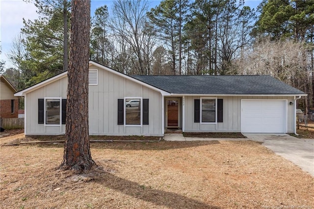 single story home with fence, board and batten siding, roof with shingles, concrete driveway, and a garage