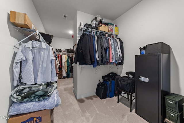 spacious closet with carpet flooring and visible vents