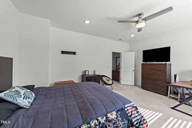 carpeted bedroom featuring recessed lighting and a ceiling fan