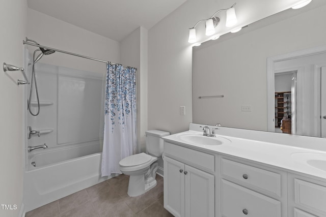 full bathroom featuring tile patterned flooring, toilet, shower / tub combo with curtain, double vanity, and a sink