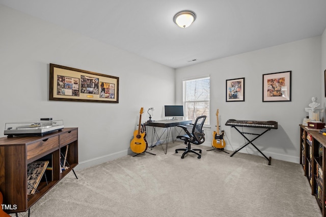 carpeted home office featuring baseboards and visible vents