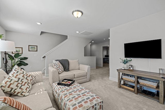 living room with visible vents, recessed lighting, stairway, baseboards, and light colored carpet