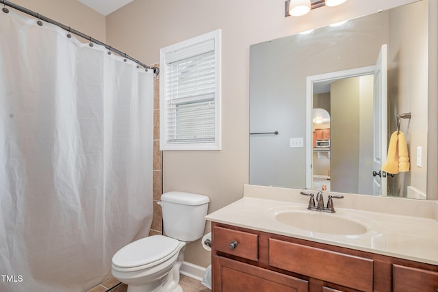 bathroom with vanity, toilet, and a shower with curtain