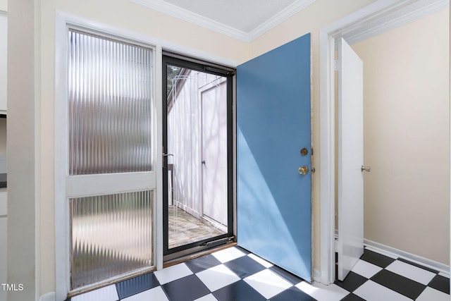 entryway featuring tile patterned floors, baseboards, and ornamental molding