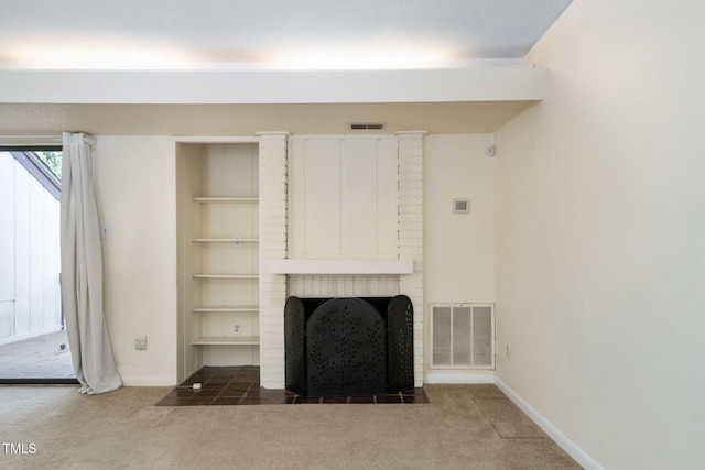 unfurnished living room featuring carpet flooring, baseboards, and visible vents