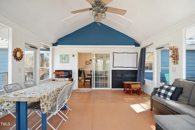 view of patio / terrace with an outdoor living space, outdoor dining area, and ceiling fan