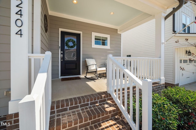 doorway to property with covered porch