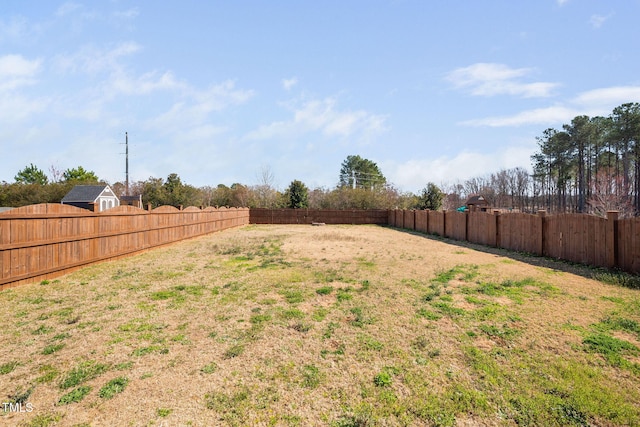 view of yard featuring a fenced backyard