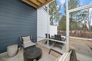 view of patio / terrace with fence