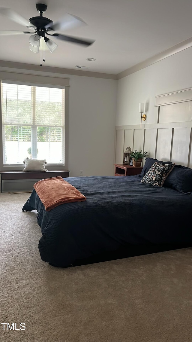 carpeted bedroom with visible vents