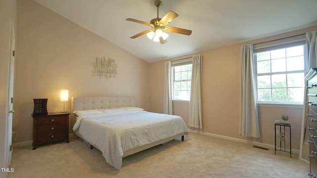 bedroom featuring visible vents, ceiling fan, baseboards, vaulted ceiling, and light carpet