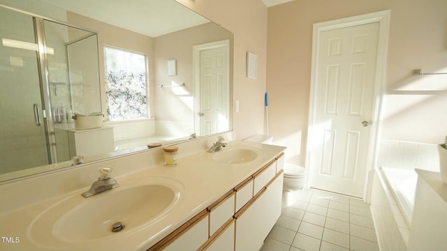 bathroom with a shower stall, a bath, and a sink