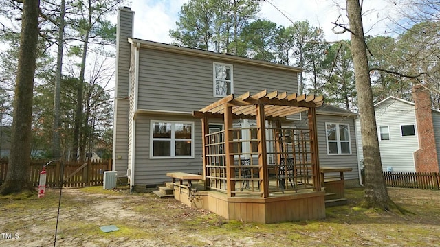 back of house featuring fence, central AC, a chimney, crawl space, and a pergola