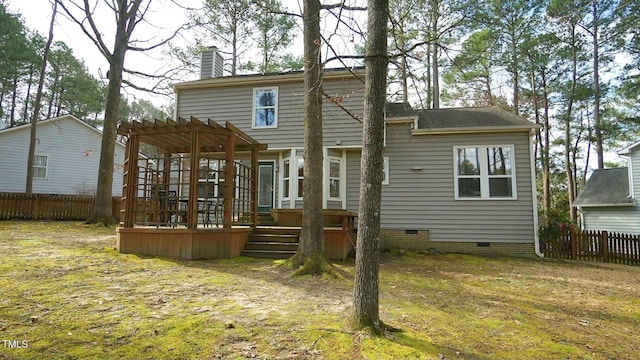 rear view of property with fence, a chimney, a deck, crawl space, and a pergola