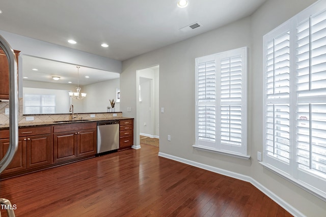 kitchen with visible vents, a sink, recessed lighting, dishwasher, and dark wood-style flooring