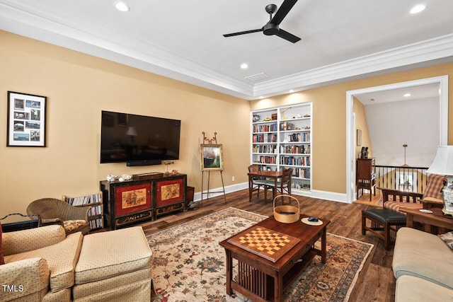 living area featuring recessed lighting, baseboards, wood finished floors, and ornamental molding