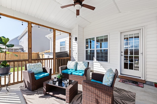 view of patio featuring an outdoor hangout area, ceiling fan, and fence