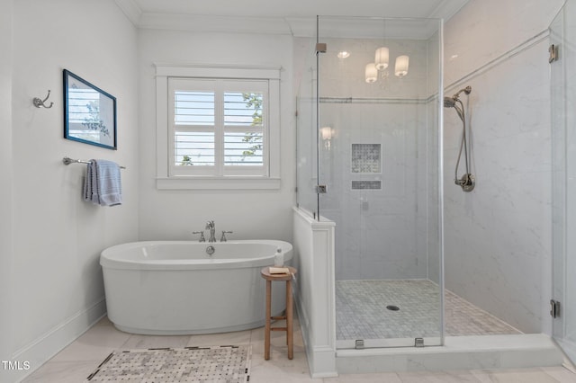 full bathroom with a soaking tub, baseboards, a stall shower, and ornamental molding