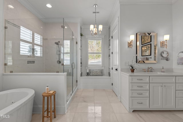 bathroom with a stall shower, ornamental molding, a soaking tub, a chandelier, and vanity