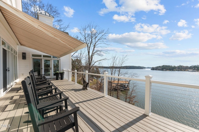 deck featuring french doors and a water view