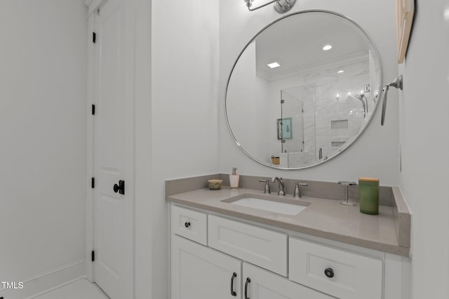 full bath featuring recessed lighting, a shower stall, vanity, and baseboards