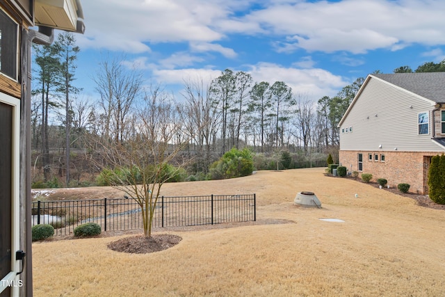 view of yard with fence