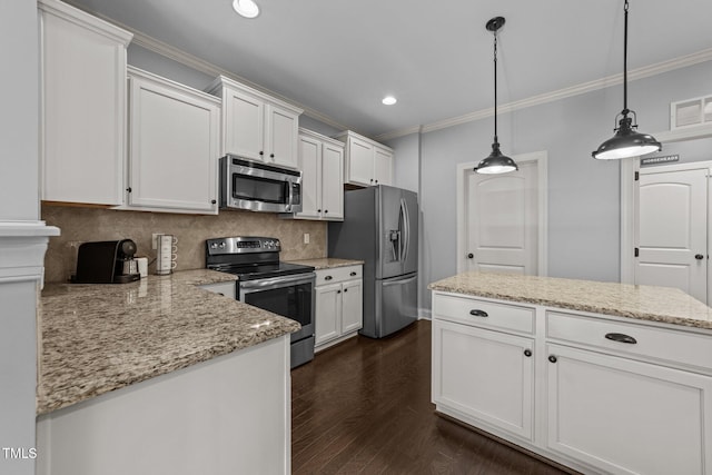 kitchen with ornamental molding, stainless steel appliances, dark wood-type flooring, white cabinets, and backsplash