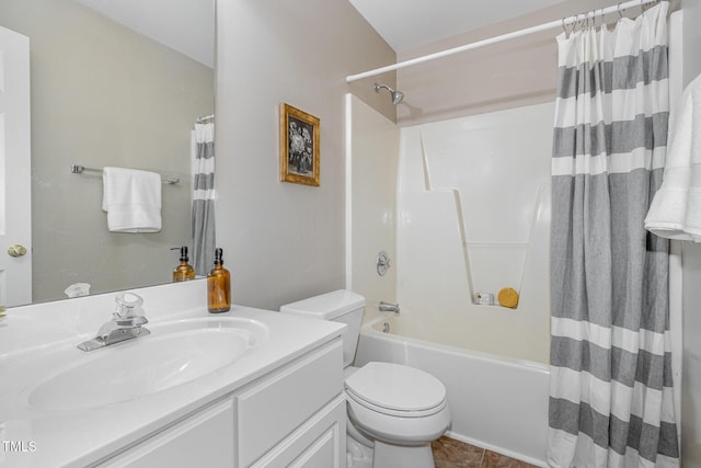 bathroom with shower / bathtub combination with curtain, toilet, and vanity