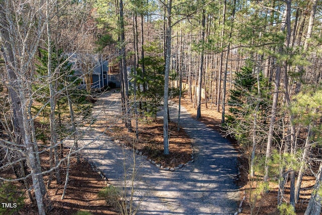 view of street featuring a view of trees