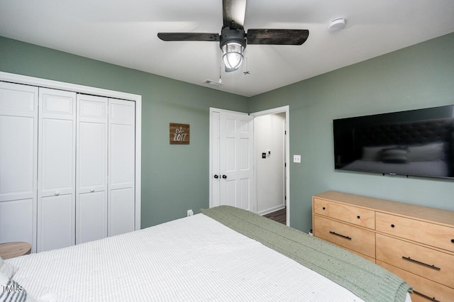 bedroom with visible vents, a closet, and ceiling fan