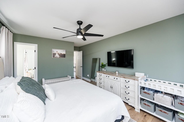 bedroom featuring light wood-style floors and ceiling fan