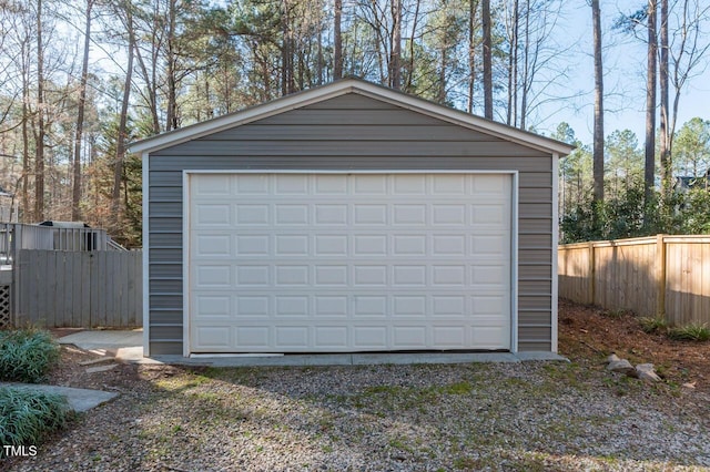 detached garage with fence