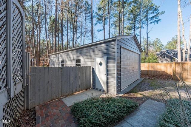 view of outdoor structure with an outdoor structure and fence