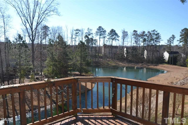 deck featuring a water view