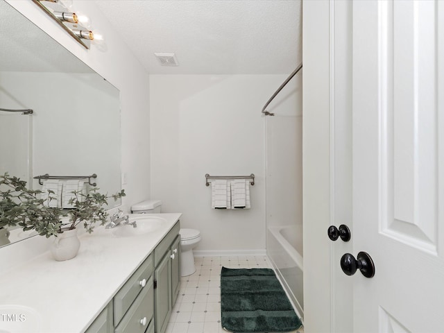 full bath with tile patterned floors, visible vents, toilet, a textured ceiling, and vanity