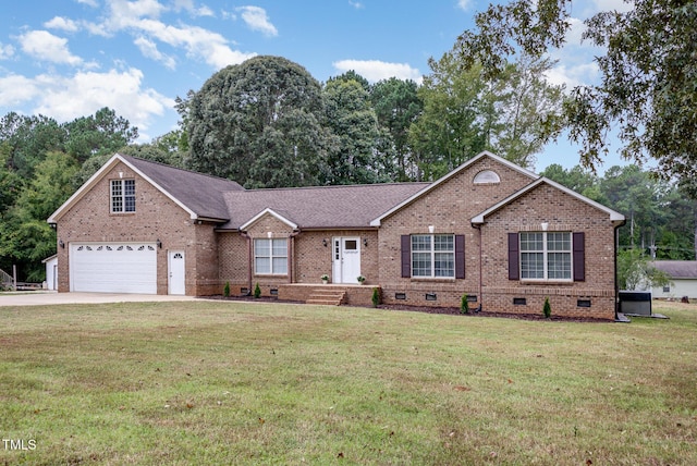 ranch-style home featuring concrete driveway, a front lawn, brick siding, and crawl space