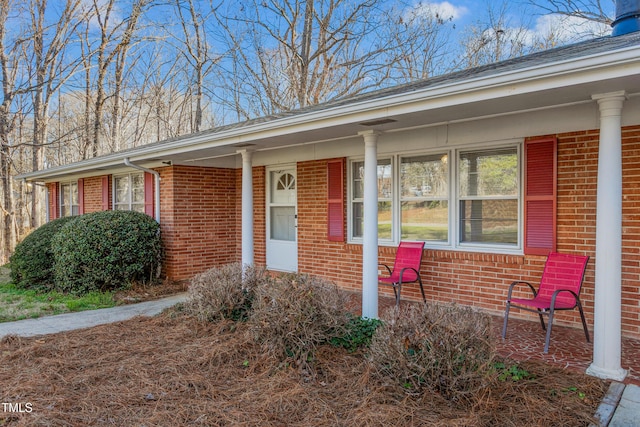 view of front of house featuring brick siding
