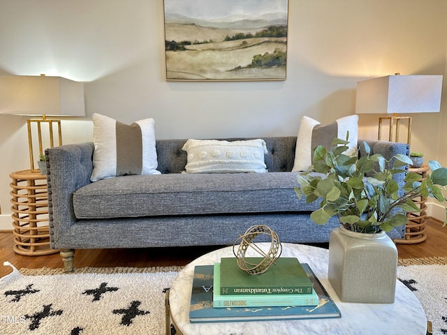 living room with wood finished floors